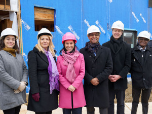 Dignitaries in front of the Projet Pie-IX construction site during the press conference announcing its new financing.